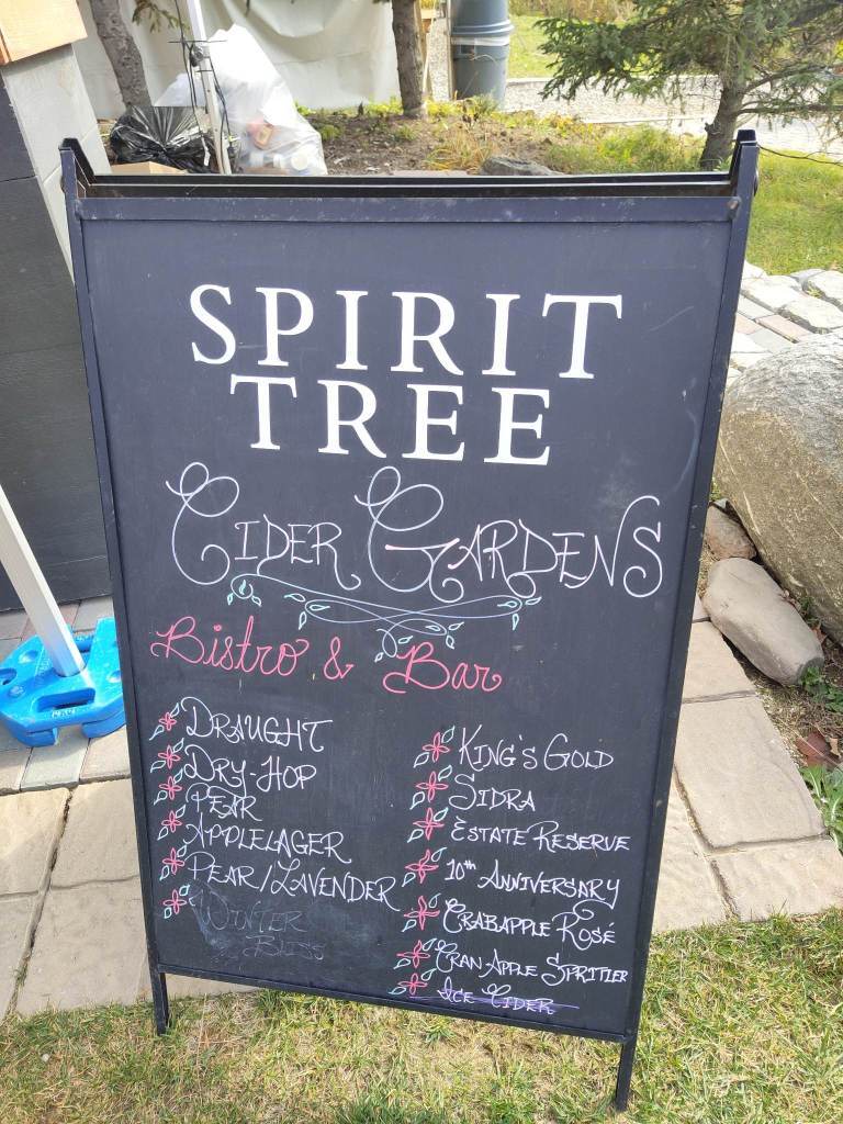 Spirit Tree Ciders Menu on a blackboard outisde.