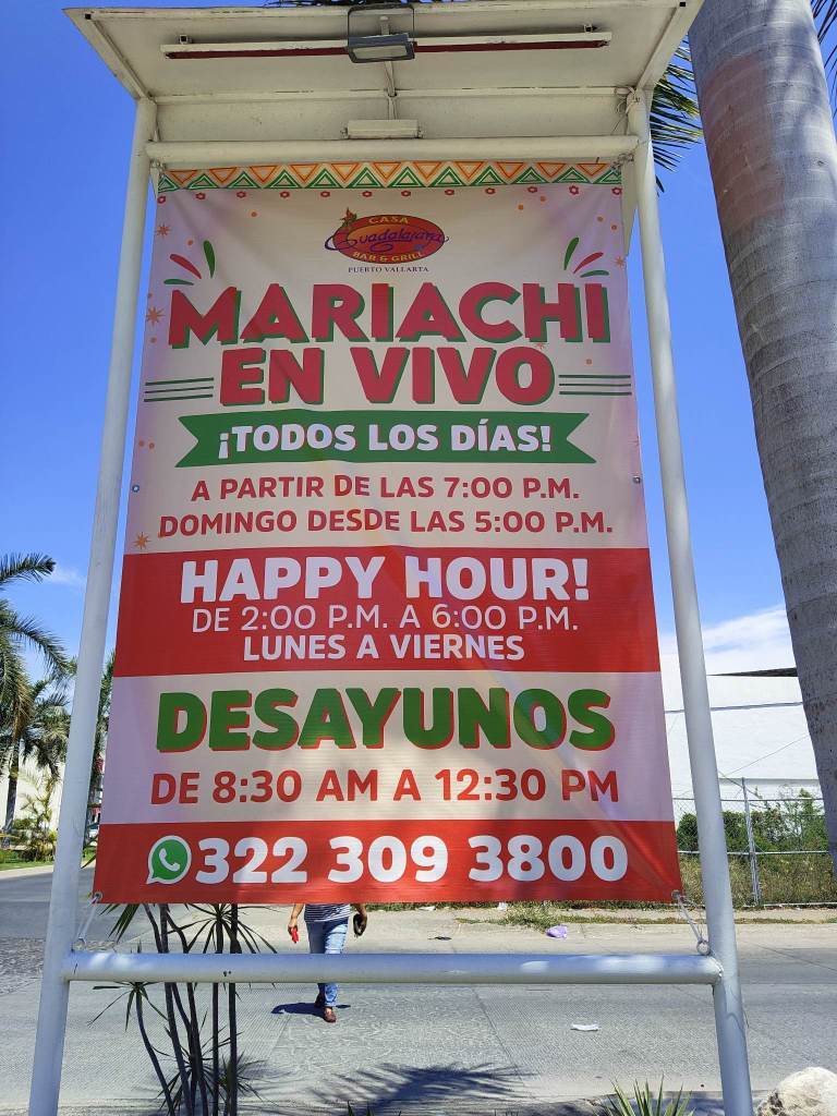 Sign for Casa Guadalajara about mariachis