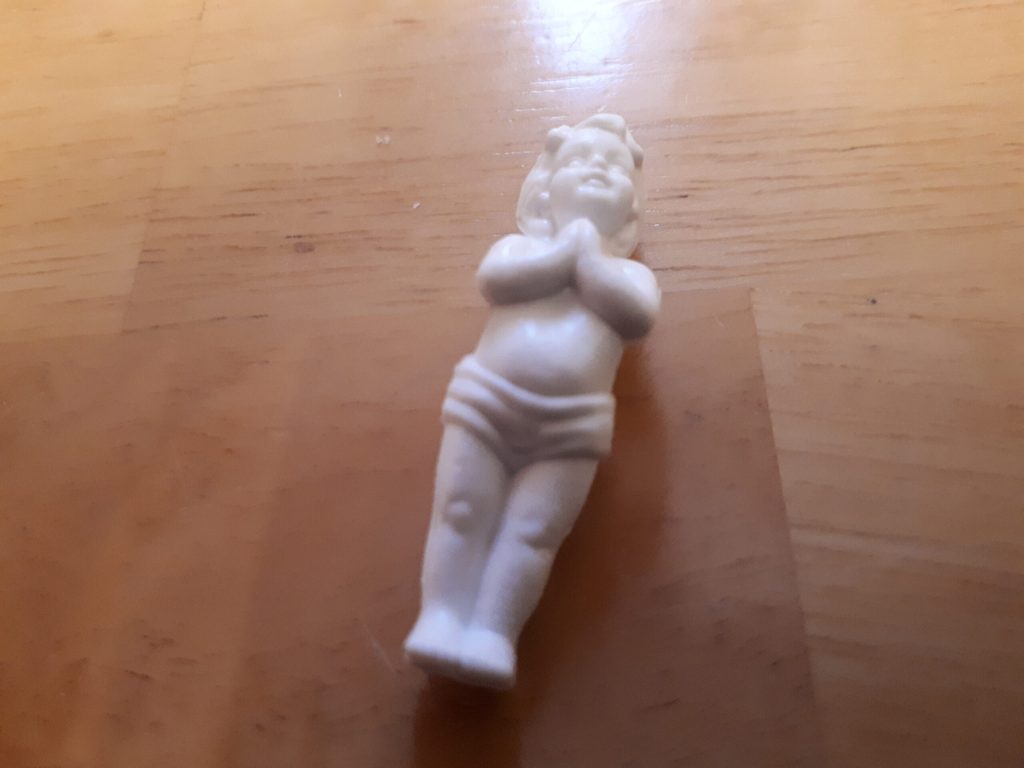 Baby Jesus figurine from a rosca