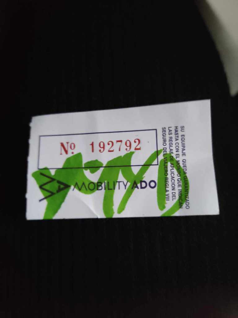 Ticket to retrieve your luggage from under a bus in Mexico